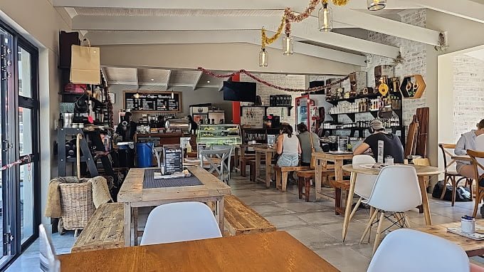 Interior of Kapstadt Brauhaus where couple enjoys the best Langebaan Restaurants