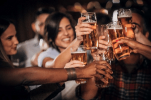 Iigroup of friends have fun and enjoy drinking at the best langebaan pubs and bars