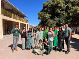 The teachers at Langebaan Primary School poses for a photo outside the school building