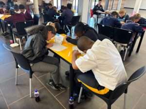 Learners of Langebaan Primary School is writing exams, concentrating on their papers