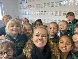 Teacher takes selfie with class children around her at Long Acres School in Langebaan