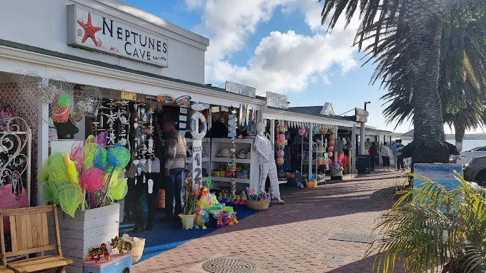 Iithe front of block of shops in bree street selling merchandise to visitors that is excellent for shopping in langebaan
