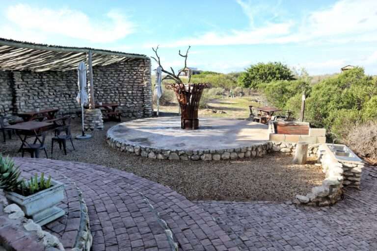 Love weskus ilove weskus ithe outside boma area built in stone around a fireplace for recreational activities