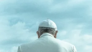 Love weskus ilove weskus ithe back view of a priest dressed in white from the catholic church in langebaan