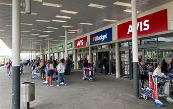 Love weskus ilove weskus ia row of car rental companies at cape town airport with lots of people standing around