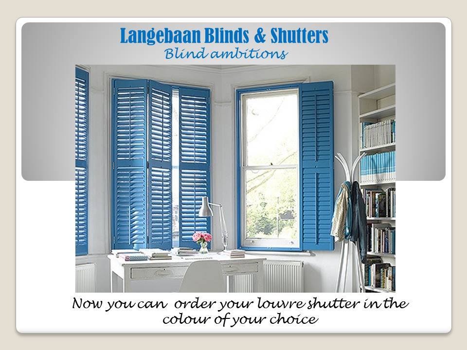 Ad banner for Langebaan Blinds & Shutters showing blue Louvre shutters in a bright home office; promotes color-custom Louvre shutters.